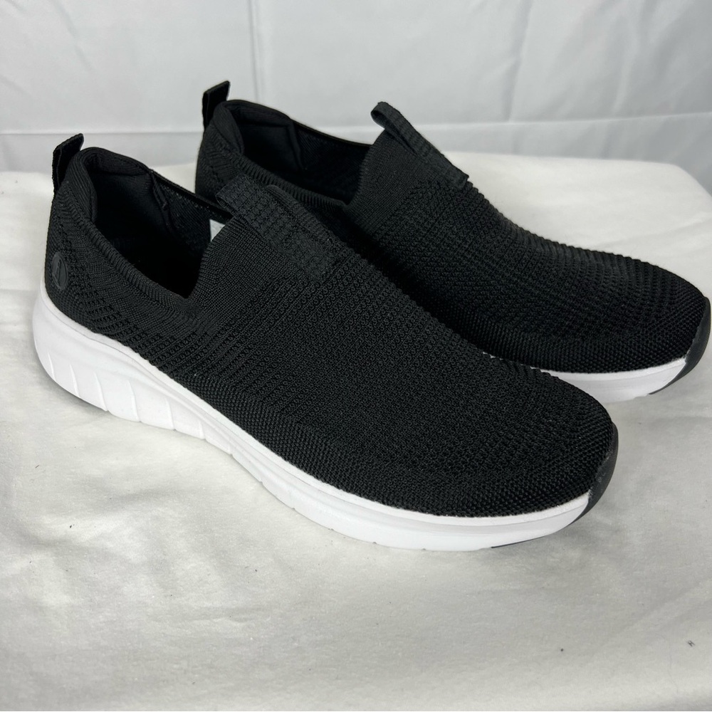 Lands’ End casual knit slip-on sneakers in black with white soles.